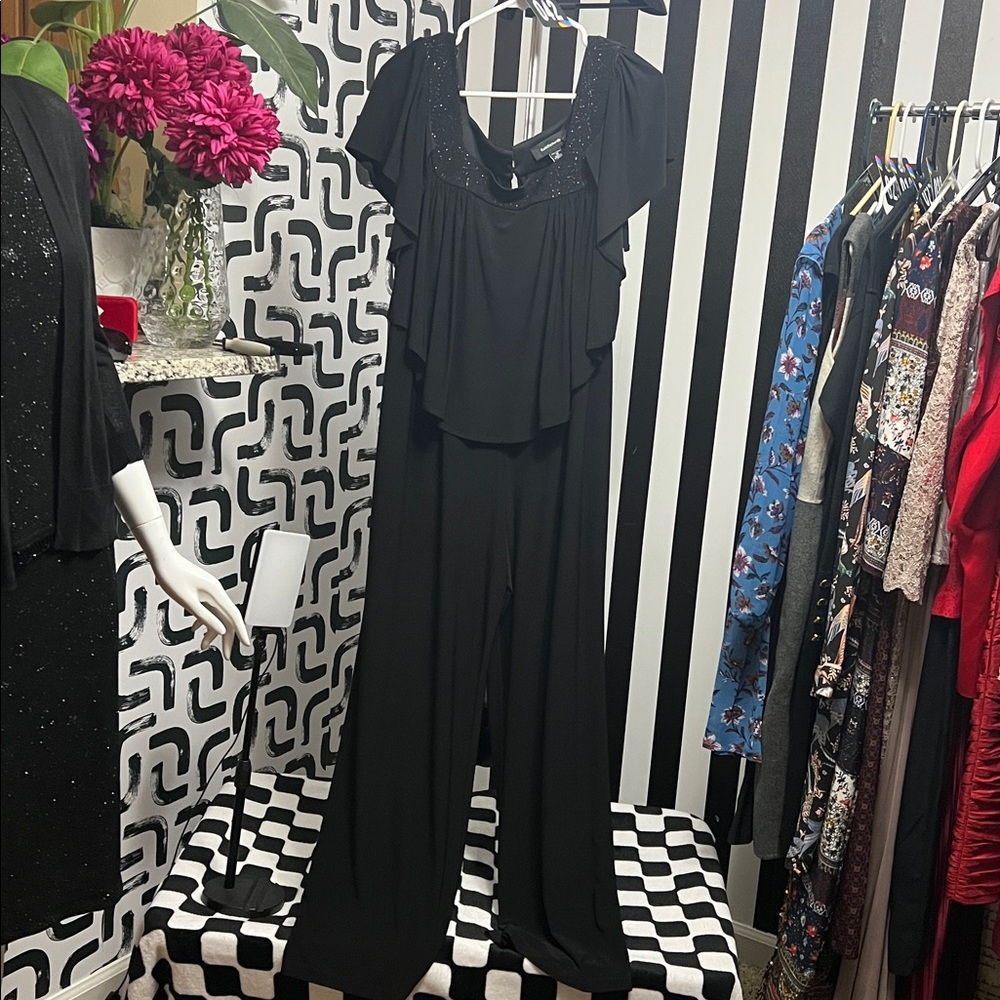 #42 R&M Richard’s Ruffle sleeveless top with silver sparkle design romper